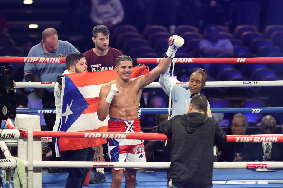 ATLANTIC CITY, NJ - JANUARY 11: Referee Sparkle Lee (r) raises the hand of Xander Zayas after winning a unanimous decision against Corey Champion on January 11, 2020 at the Hard Rock Hotel & Casino in Atlantic City, New Jersey. (Photo by Edward Diller/Getty Images)