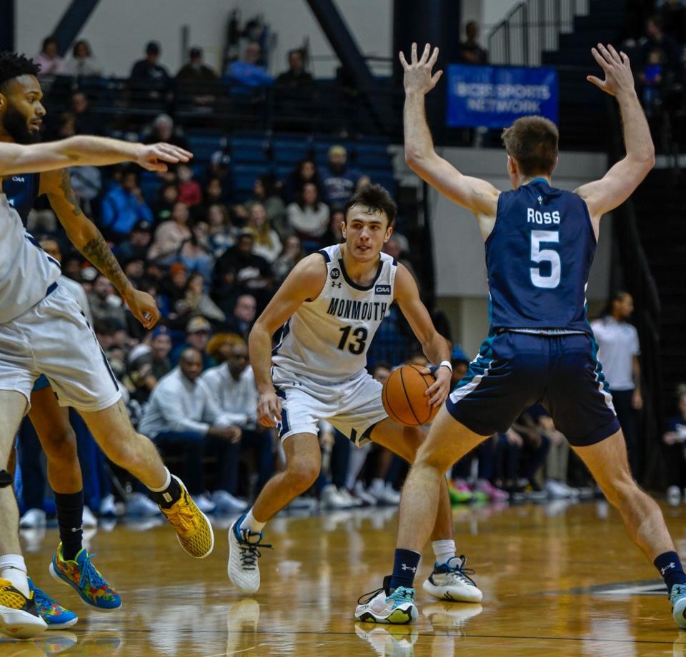 Monmouth's Jack Collins dribbles against UNC Wilmington on Dec. 28, 2022 in West Long Branch.