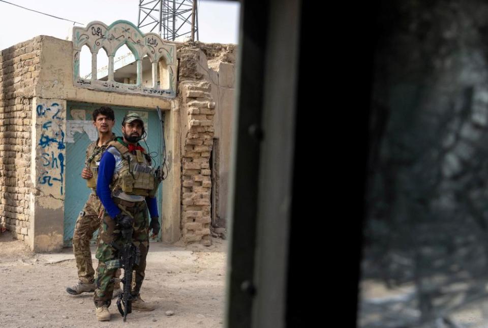 Members of the Afghan special forces regroup after heavy clashes with Taliban in Kandahar province in July.