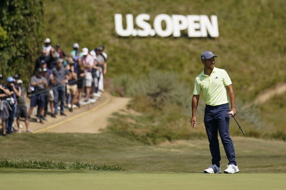 Xander Schauffele watches his putt on the fourth hole during the second round of the U.S. Open golf tournament at Los Angeles Country Club on Friday, June 16, 2023, in Los Angeles. (AP Photo/Marcio J. Sanchez)