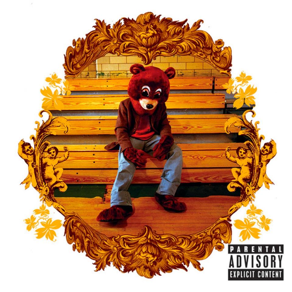 The album cover of ‘College Dropout’ sees Kanye slouched on the bleachers wearing the head of a bear mascot costume (Def Jam)