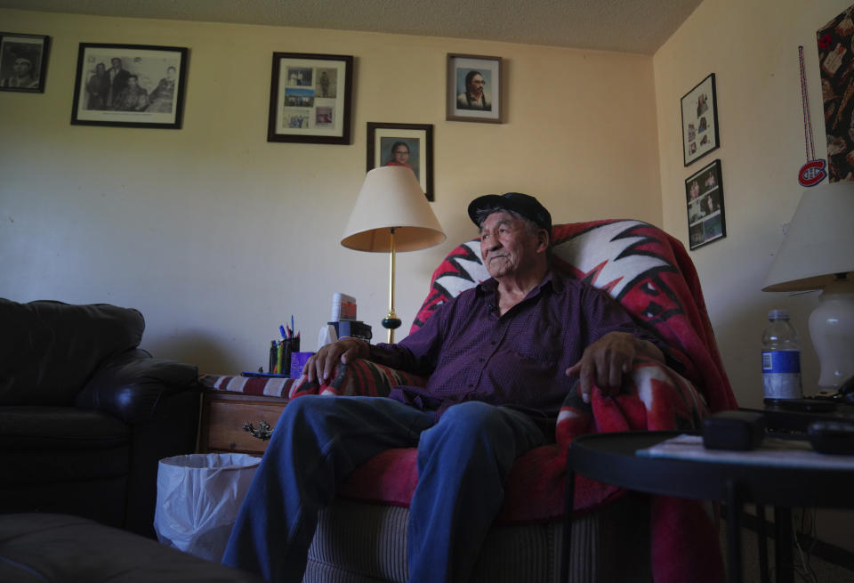 George Pipestem, a survivor of the Ermineskin residential school, sits in his living room on Tuesday, July 19, 2022, in Maskwacis, Alberta. He is not looking forward to Pope Francis' public apology, stating that those who committed the abuse should be the ones to apologies. (AP Photo/Jessie Wardarski)