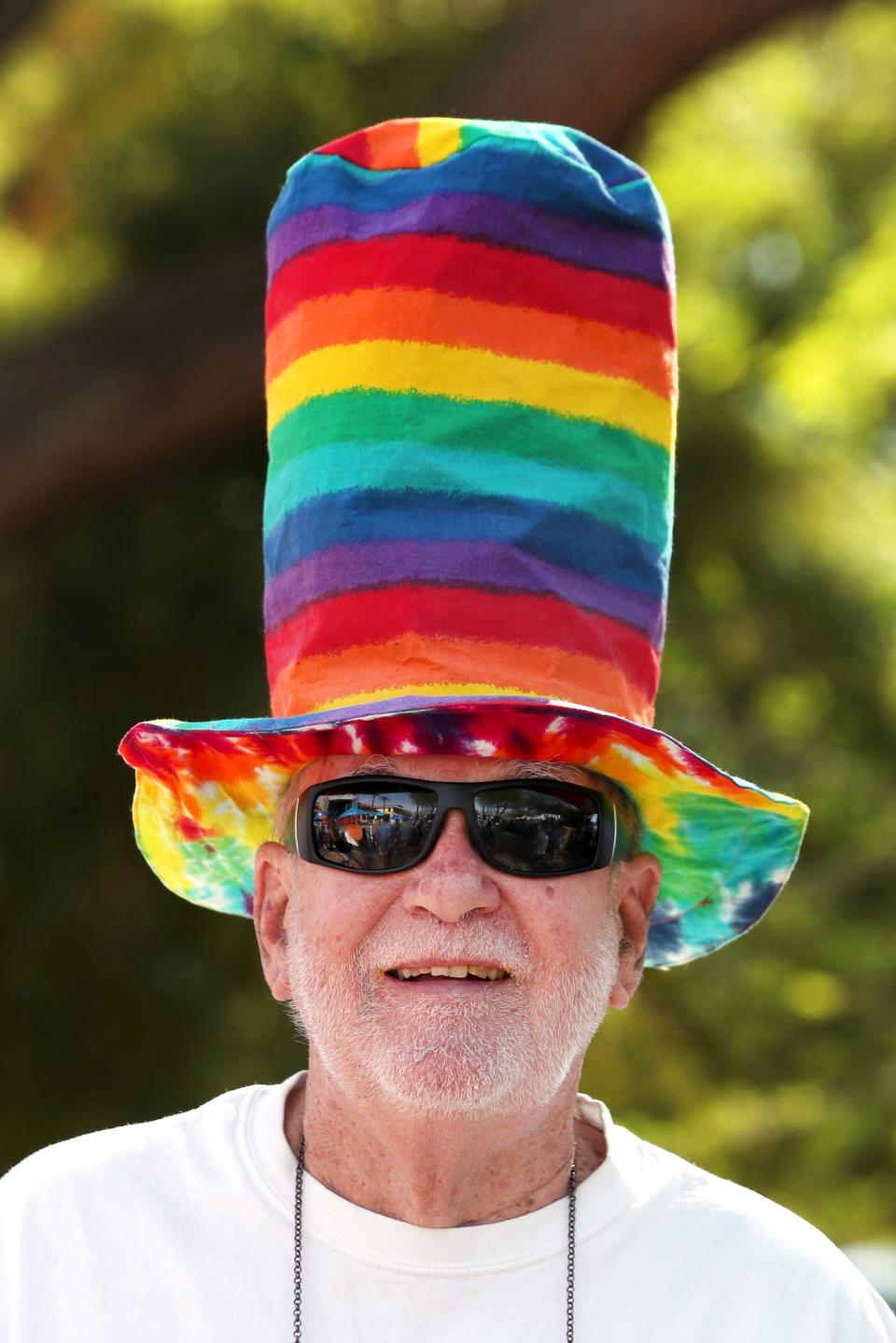 Don Ricart of Cathedral City wears a tall rainbow hat during the annual Cathedral City LGBT Days Bed Race and Parade on Avenue Lalo Guerrero in Cathedral City, Calif., on Sunday, March 27, 2022. 