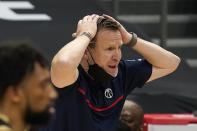 Washington Wizards head coach Scott Brooks reacts to an official's call during the second half of an NBA basketball game against the Toronto Raptors Thursday, May 6, 2021, in Tampa, Fla. (AP Photo/Chris O'Meara)