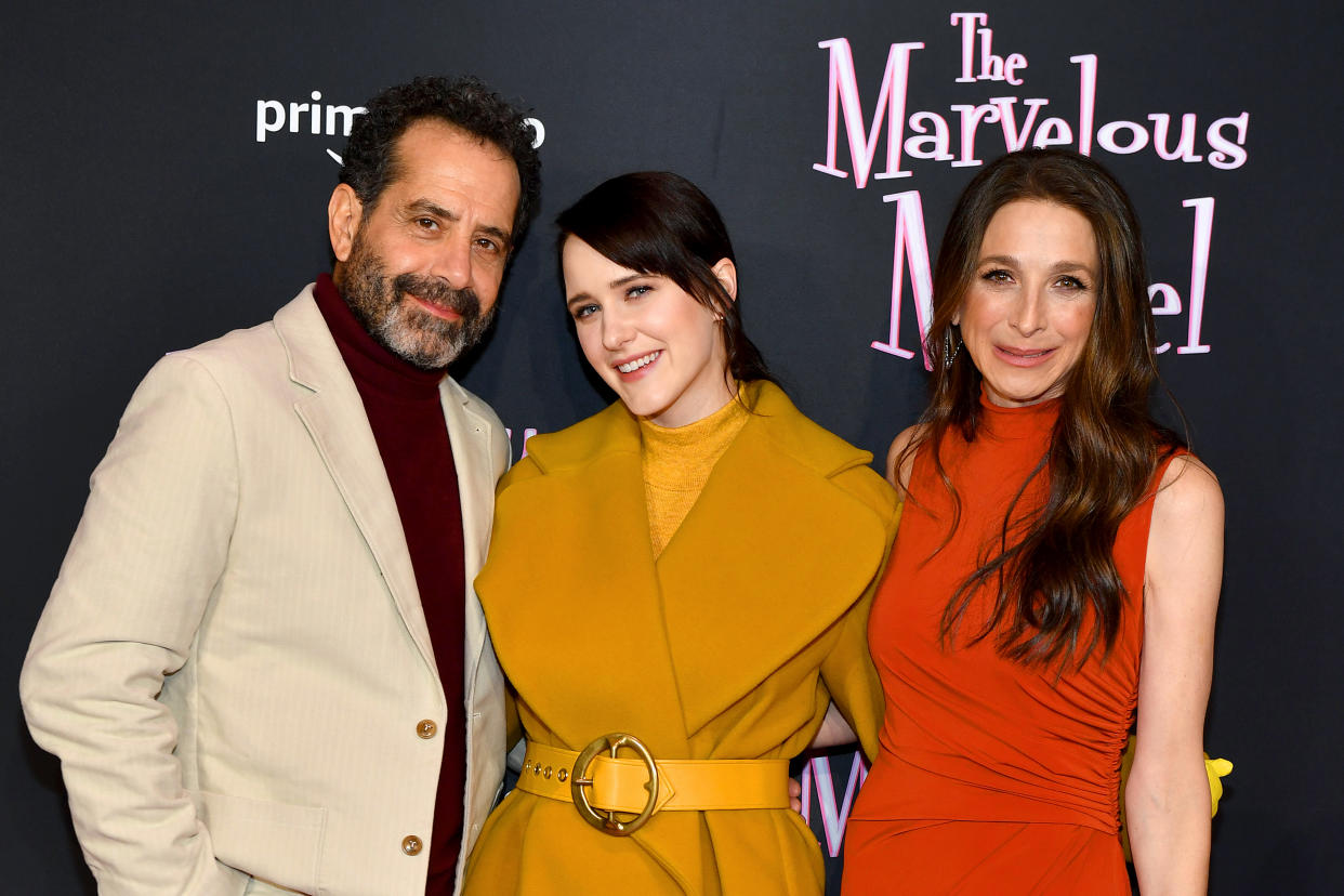 NEW YORK, NEW YORK - FEBRUARY 05: (L-R) Tony Shalhoub, Marin Hinkle, and Rachel Brosnahan attend as The Marvelous Mrs. Maisel celebrates the fourth season premiere at the 1960's themed Maisel Skate Night at Winter Village at Bryant Park Ice Rink on February 05, 2022 in New York City. (Photo by Noam Galai/Getty Images for Prime Video)