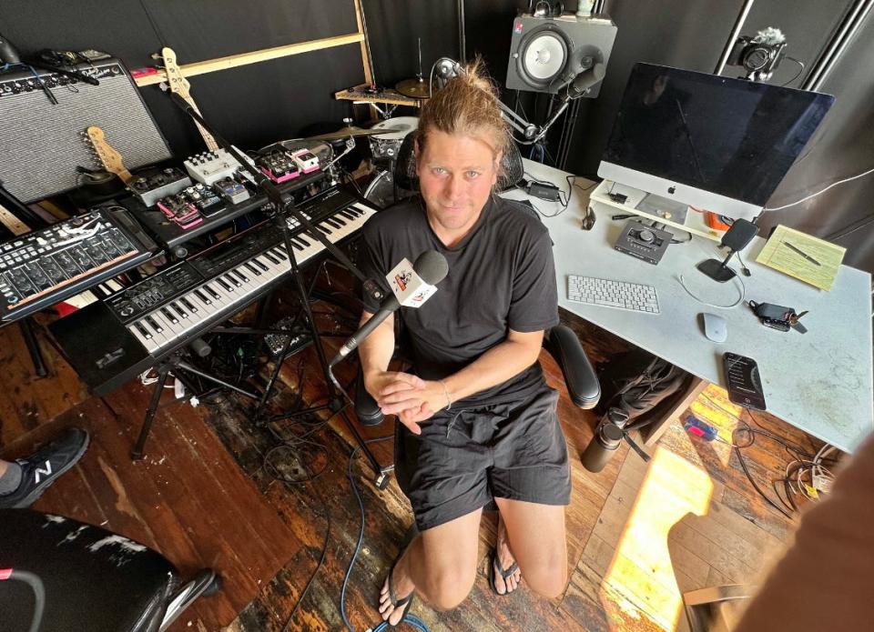 Musician, podcaster and talk-show guy Bill Bartholomew in the studio of his Providence loft, where lives and works.