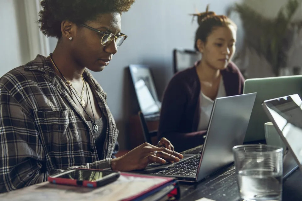 //www.gettyimages.com/detail/photo/female-friends-studying-together-at-home-royalty-free-image/1406476202?phrase=computer+science+students&adppopup=true" rel="nofollow noopener" target="_blank" data-ylk="slk:The Good Brigade/DigitalVision via Getty Images;elm:context_link;itc:0;sec:content-canvas" class="link ">The Good Brigade/DigitalVision via Getty Images</a>