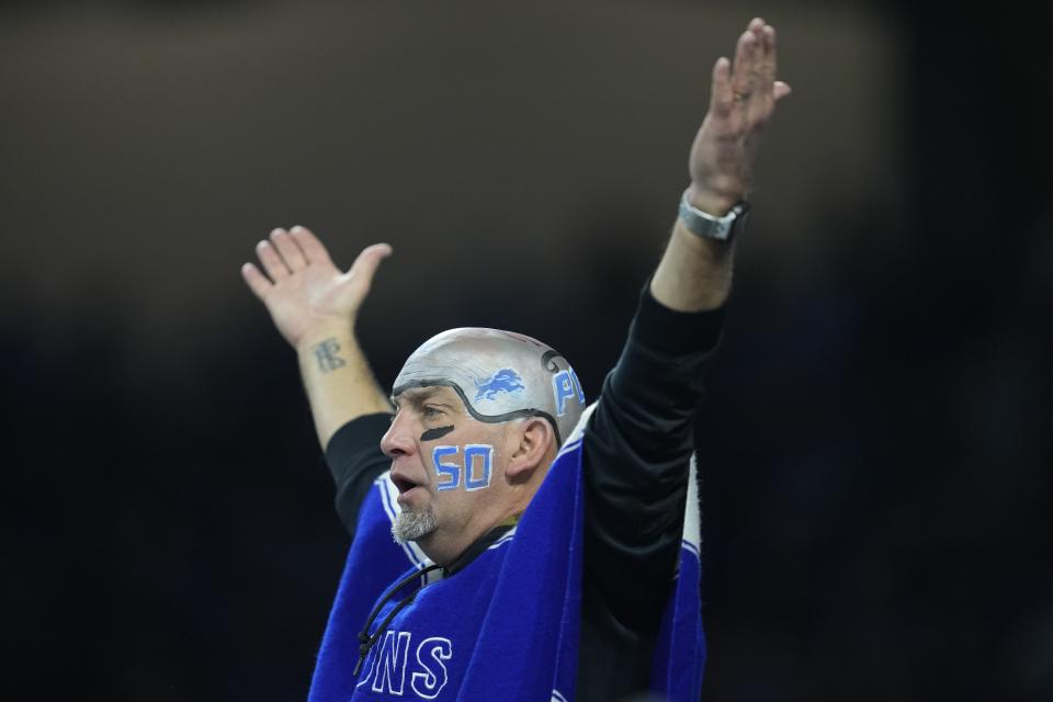 A Detroit Lions fan reacts during the first half of an NFL football game against the Minnesota Vikings Sunday, Dec. 11, 2022, in Detroit. (AP Photo/Paul Sancya)