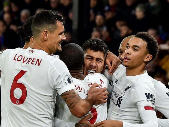 Liverpool celebrate their late winner at Selhurst Park (Getty)