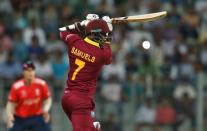 Cricket - West Indies v England - World Twenty20 cricket tournament - Mumbai, India, 16/03/2016. West Indies Marlon Samuels plays a shot. REUTERS/Danish Siddiqui