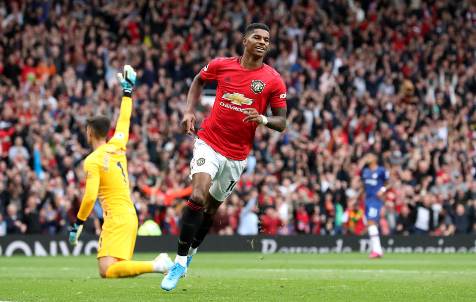 Manchester United's Marcus Rashford celebrates scoring his side's third goal (Martin Rickett/PA Wire)