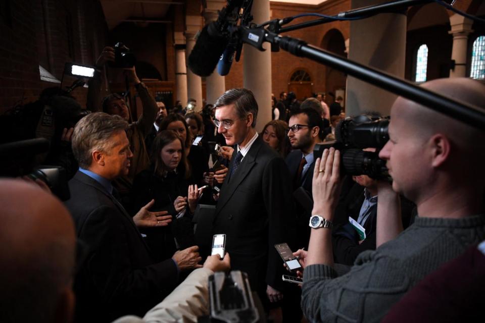 Jacob Rees-Mogg leaves after the Q&A session with reporters on Brexit (EPA)