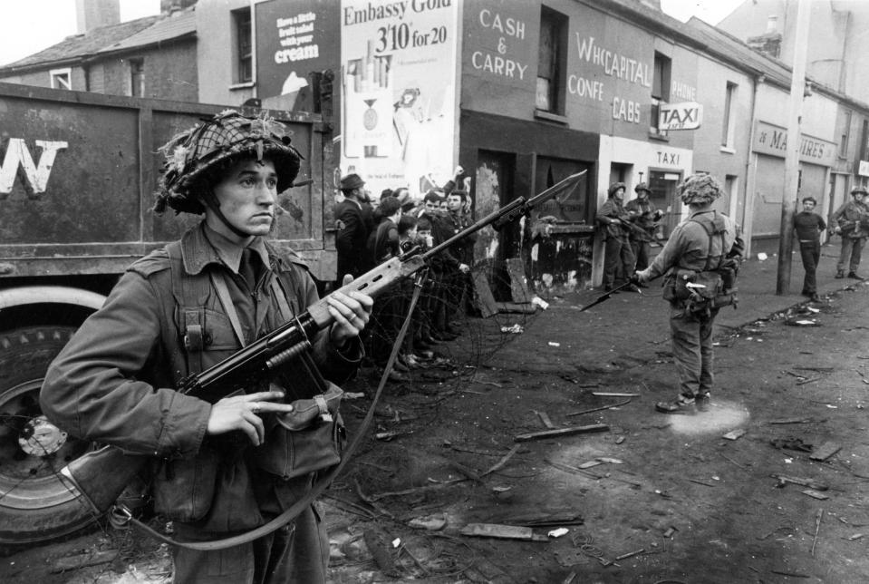August 1969: newly arrived British soldiers on guard in the Catholic Falls Road area of BelfastGetty