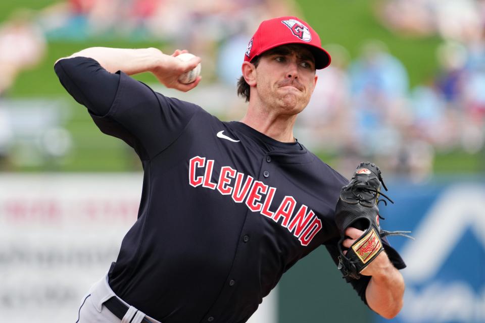 Mar 12, 2024; Surprise, Arizona, USA; Cleveland Guardians starting pitcher Shane Bieber (57) bats against the Texas Rangers during the second inning at Surprise Stadium. Mandatory Credit: Joe Camporeale-USA TODAY Sports