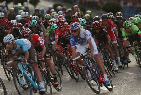 Team Sky rider Chris Froome of Britain (C) rides during the last stage of the La Vuelta Tour of Spain cycling race in Madrid, Spain, September 10, 2017. REUTERS/Susana Vera