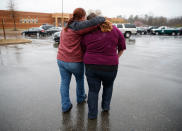 <p>A mother walks her daughter, a student from Great Mills High School, to the car as she picks her up from Leonardtown High School in Leonardtown, Md., Tuesday, March 20, 2018. (Photo: Carolyn Kaster/AP) </p>