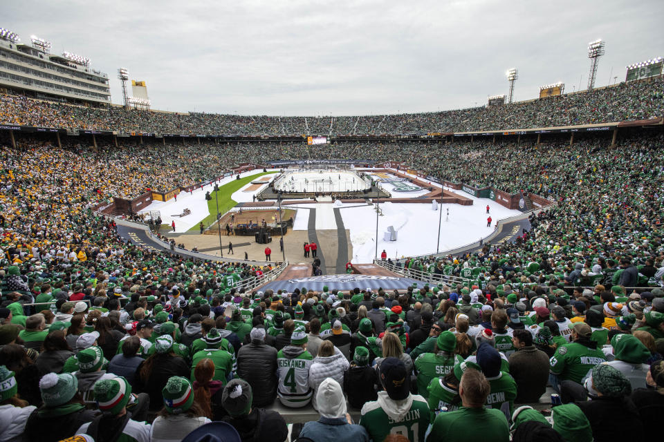 FILE - Fans watch the NHL Winter Classic hockey game between the Dallas Stars and the Nashville Predators at the Cotton Bowl on Jan. 1, 2020, in Dallas. A crowd of 85,630 fans attended the game. That’s been part of a larger trend of so-called “non-traditional” markets drawing marquee league events such as outdoor games to Nashville and Dallas, Florida hosting the 2023 All-Star game or the June 2023 draft in Nashville. (AP Photo/Jeffrey McWhorter, File)