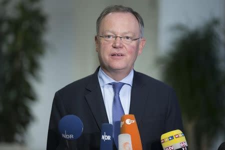 Stephan Weil, Prime Minister of Lower Saxony and member of the Supervisory board of German car maker Volkswagen, speaks to the media after a news conference at the company's headquarters in Wolfburg, Germany October 7, 2015. REUTERS/Axel Schmidt