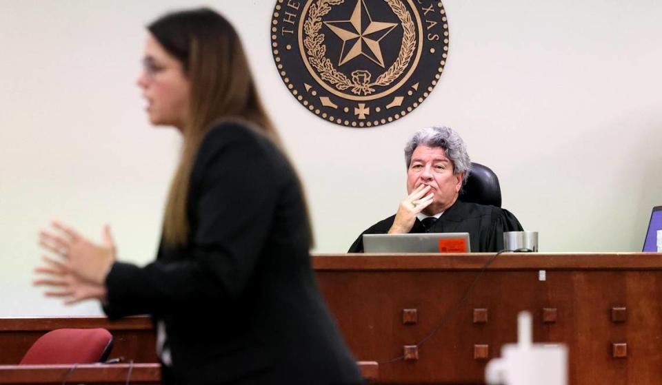 396th District Judge George Gallagher listens as Assistant Criminal District Attorney Katie Owens gives her closing arguments in the trial of defendant Braylin Brown on Nov. 9.