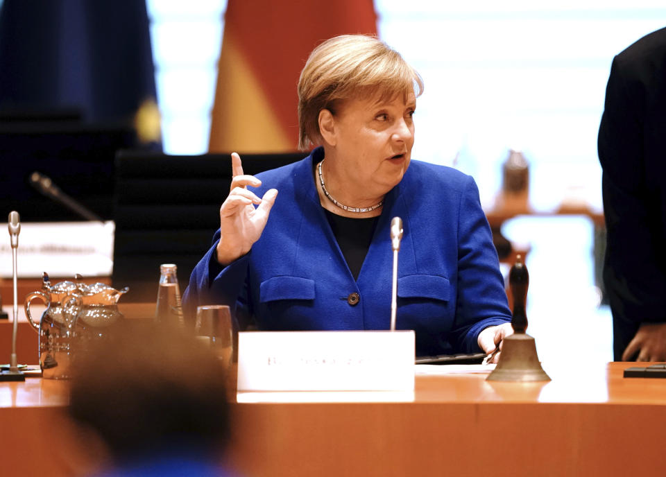 Chancellor Angela Merkel attends the meeting of the Federal Cabinet in the Federal Chancellery in Berlin, Germany, Wednesday, May 13, 2020. (Kay Nietfeld/dpa via AP)