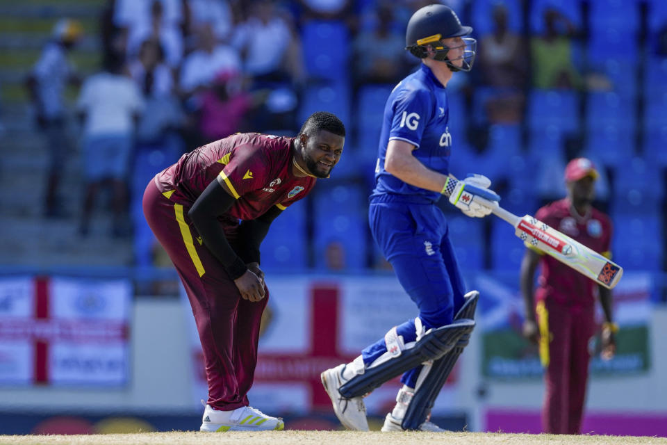 West Indies' Oshane Thomas gestures during his bowling against England in the first ODI cricket match at Sir Vivian Richards Stadium in North Sound, Antigua and Barbuda, Sunday, Dec. 3, 2023. (AP Photo/Ricardo Mazalan)