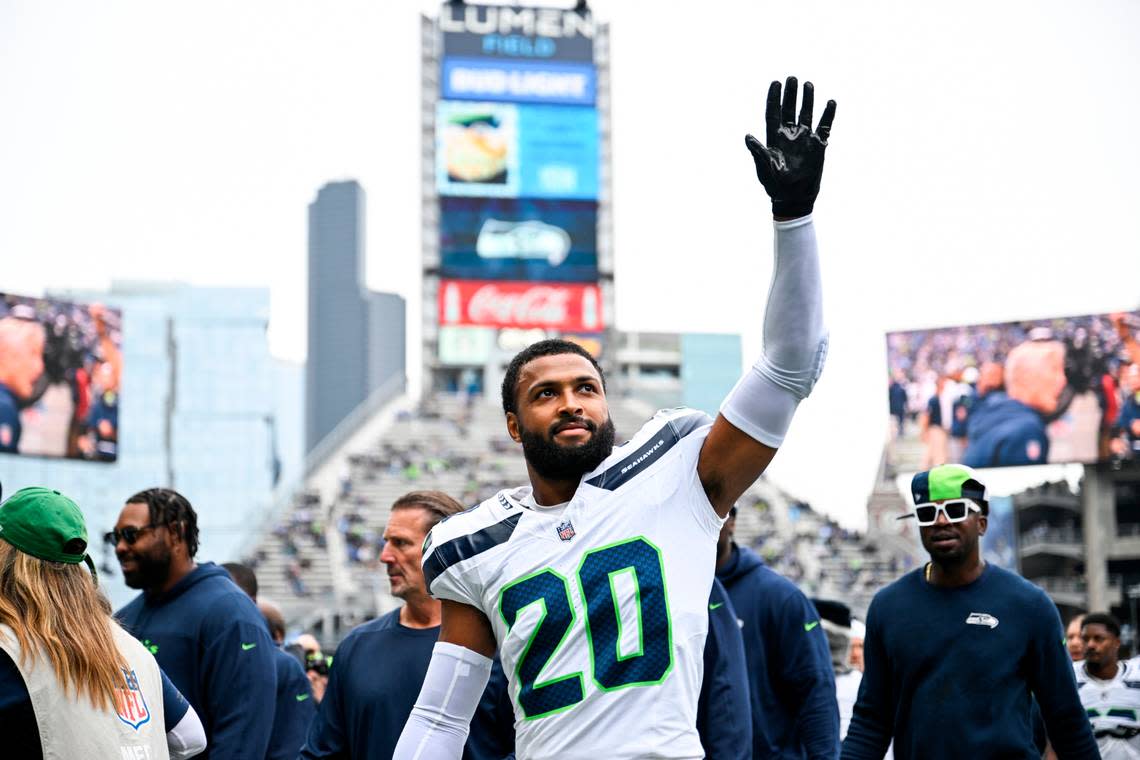 Seattle Seahawks safety Julian Love (20) waves to fans before the game between the Seattle Seahawks and the Carolina Panthers at Lumen Field, Sunday, Sept. 24, 2023, Seattle, Wash.