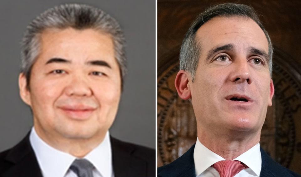 Raymond Chan, left, and Los Angeles Mayor Eric Garcetti.