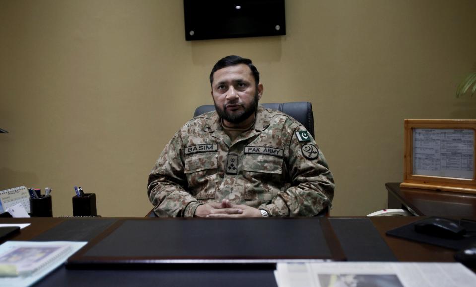 In this Wednesday, Jan. 8, 2014 photo, Brig. Basim Saeed, head of Pakistan's Counter IED Explosives and Munitions School, during an interview with The Associated Press at a military base in Risalpur, Pakistan. Militants in Pakistan have become devilishly ingenious about where they plant improvised explosive devices, a type of bomb responsible for thousands of wounds and deaths in Pakistan. They’ve been found strapped to children’s bicycles, hidden inside water jugs and even hung in tree branches. (AP Photo/Anjum Naveed)