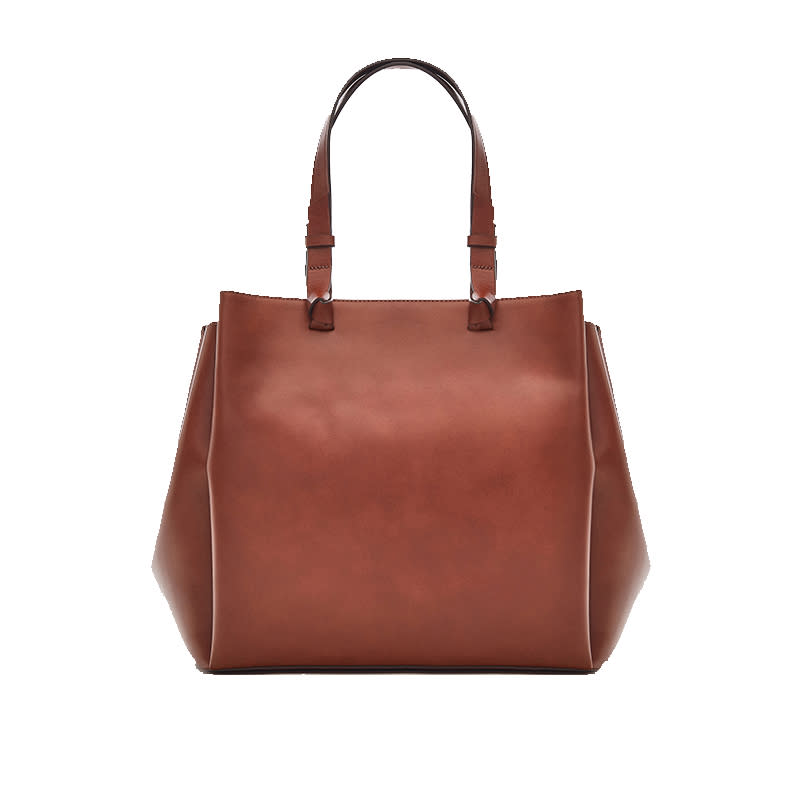 <a rel="nofollow noopener" href="https://www.massimodutti.com/ca/women/bags-%26-wallets/leather-tote-bag-with-knotted-details-c675016p7906126.html?colorId=702&parentId=7906127" target="_blank" data-ylk="slk:Leather Tote Bag With Knotted Details, Massimo Dutti, $275;elm:context_link;itc:0;sec:content-canvas" class="link ">Leather Tote Bag With Knotted Details, Massimo Dutti, $275</a>