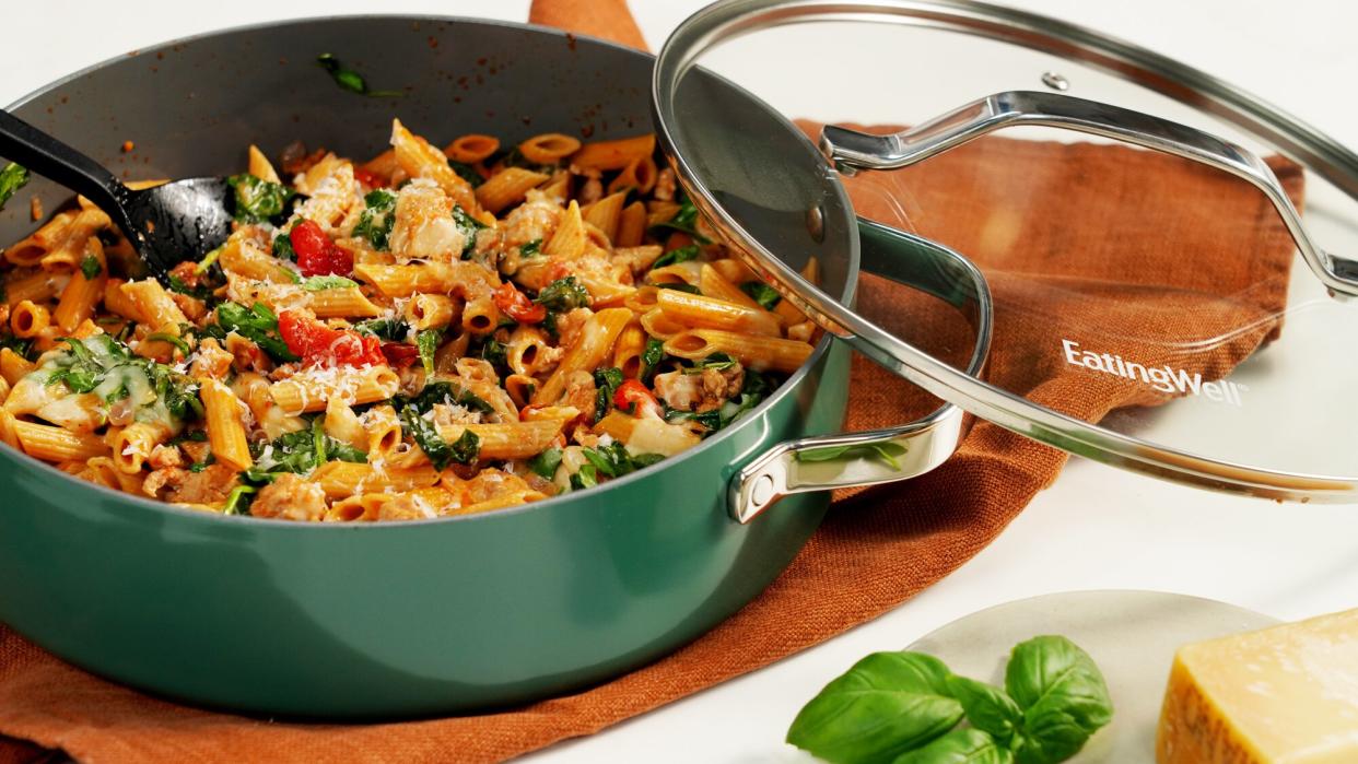 a photo of a pan from EatingWell's latest cookware collection with One Skillet Easy Ground Chicken Pasta in the pot