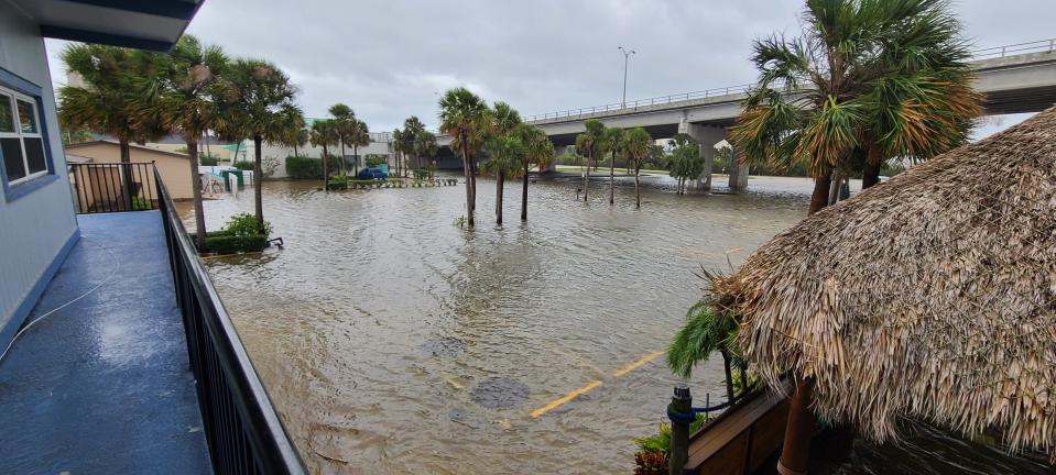 The "Down Under" area in Port Orange flooded as  Tropical Storm Nicole blew through Volusia County. "The first high tide before the storm was ready to come ashore really didn’t have much flooding at all," said Two Jerks Seafood co-owner Mike Freeman. "About eight hours later (at 1 p.m. Thursday), the second high tide started to roll in and took about 30 minutes until water went from half a foot under the dock to covering all the way over to Jimmy Hula's and the parking lot.