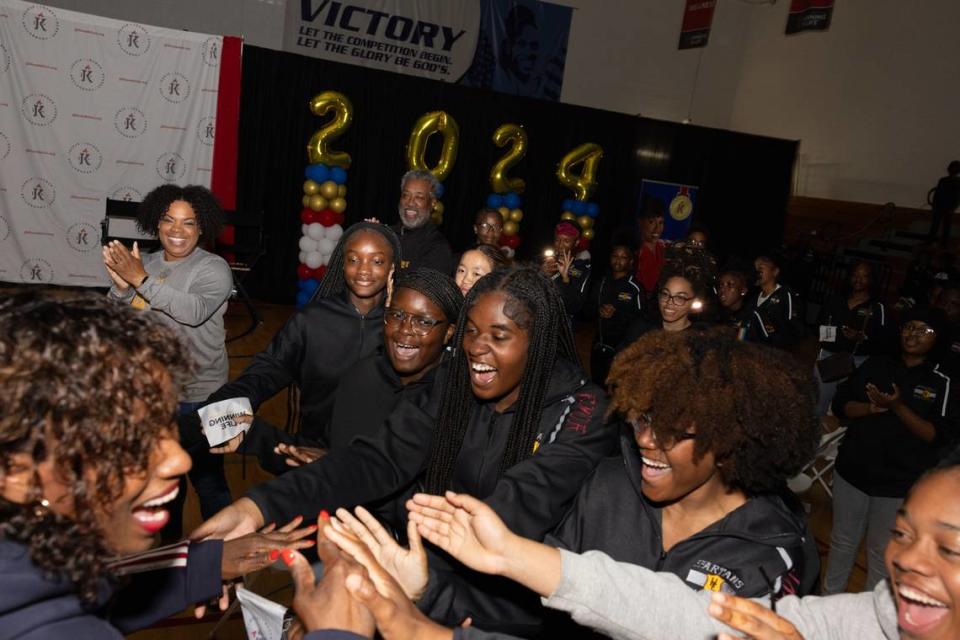 Jackie Joyner-Kersee greets athletes from Hazelwood East High School during a rally at the Jackie Joyner-Kersee Community Center in East St. Louis, Ill. on April 12, 2024. The center promotes a large array of community and athletic programs and bares a motto that Joyner-Kersee has displayed throughout her athletic and philanthropic career: Winning in Life. Joshua Carter/Belleville News-Democrat