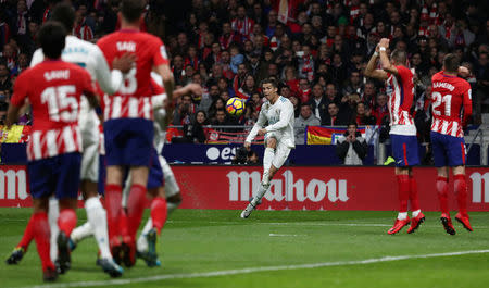 Soccer Football - La Liga Santander - Atletico Madrid v Real Madrid - Wanda Metropolitano, Madrid, Spain - November 18, 2017 Real Madrid’s Cristiano Ronaldo shoots at goal REUTERS/Juan Medina