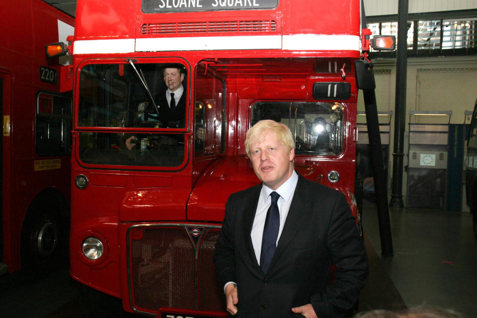 Mayor of London, Boris Johnson stands in front of a London Transport Routemaster bus, at the London Transport Museum in central London. London mayor Boris Johnson launched a competition today to design a possible new "green" replacement for the "much missed" jump-on, jump-off double-decker Routemaster bus. The red driver-and-conductor Routemasters were withdrawn from regular service in 2005.