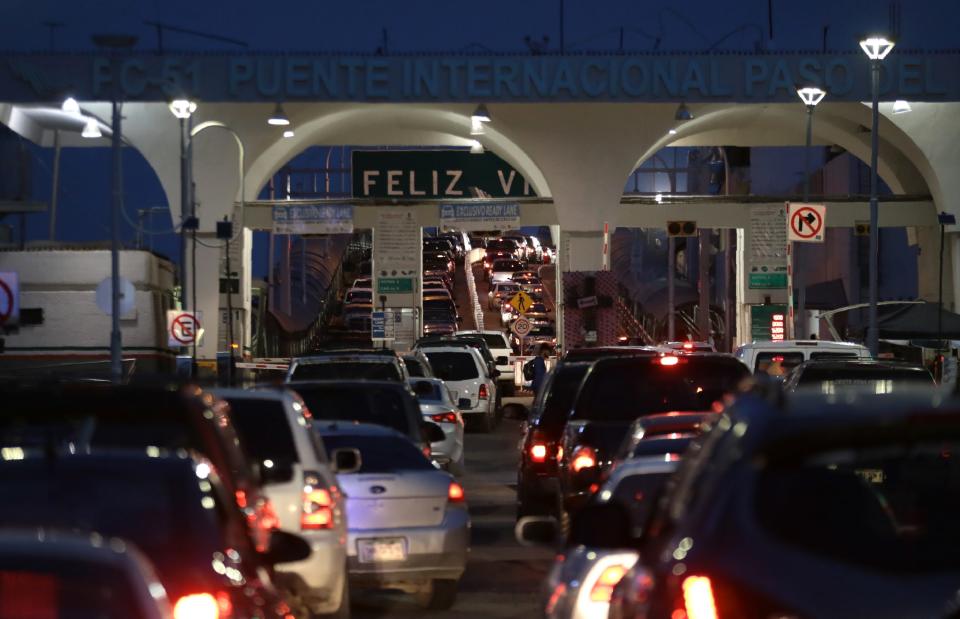 A sign stating “Feliz Viaje” or “Have a Good Trip,” greets motorists at the Paso del Norte international bridge between El Paso, Texas, and Juárez, Mexico, in this file photo from 2019.