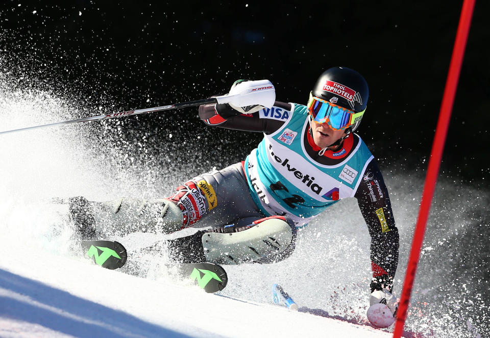 David Chodounsky, of the US, speeds down the course during the first run of an alpine ski men's World Cup slalom in Adelboden, Switzerland, Sunday, Jan. 12, 2014. (AP Photo/Giovanni Auletta)