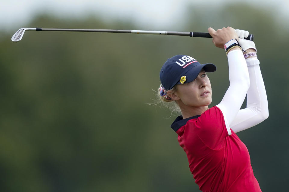 United States' Nelly Korda watches her tee shot during the foursome matches at the Solheim Cup golf tournament, Sunday, Sept. 5, 2021, in Toledo, Ohio. (AP Photo/Carlos Osorio).