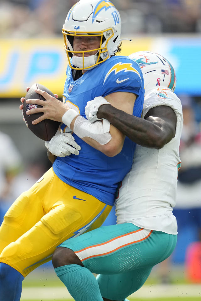 September 12, 2021: Los Angeles Chargers defensive end Joey Bosa (97)  stretches before the NFL regular season game between the Los Angeles  Chargers and the Washington Football Team at FedEx Field in