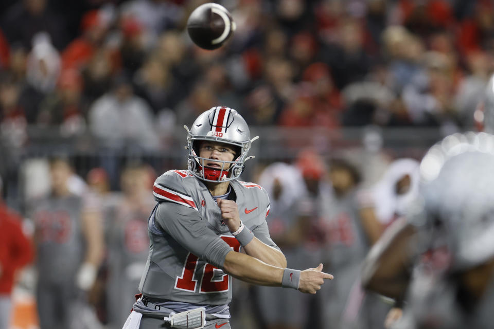 Ohio State quarterback Lincoln Kienholz throws a a pass against Michigan State during the second half of an NCAA college football game Saturday, Nov. 11, 2023, in Columbus, Ohio. (AP Photo/Jay LaPrete)