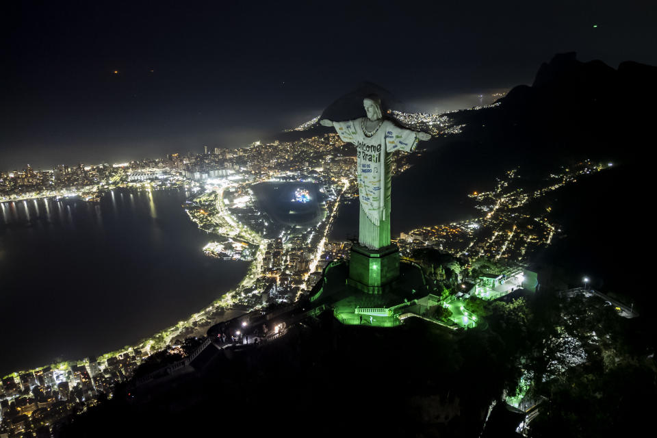 The Christ the Redeemer statue is illuminated with a welcome message for American singer Taylor Swift, in Rio de Janeiro, Brazil, Thursday, Nov. 16, 2023. (AP Photo/Bruna Prado)