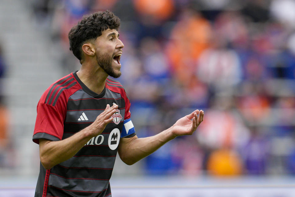 Toronto FC's Jonathan Osorio reacts during the first half of a MLS soccer match against FC Cincinnati Sunday, Feb. 25, 2024, in Cincinnati. (AP Photo/Jeff Dean)