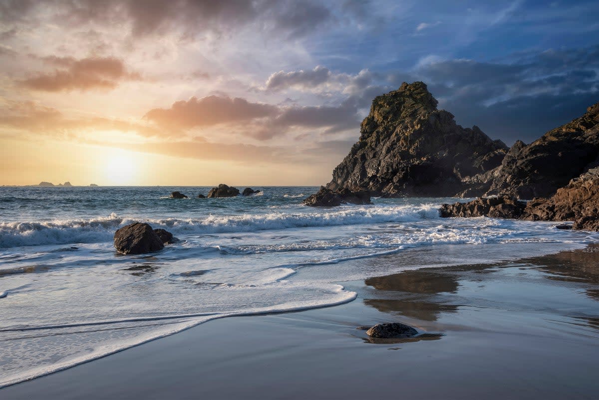 A sunset over part of Kynance Cove (Getty Images/iStockphoto)