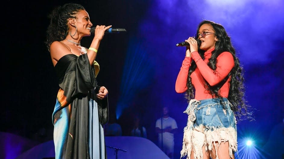 (L-R) Goapele and H.E.R. perform together on Day 2 of the 2021 Lights Up Music Festival at Concord Pavilion on September 19, 2021 in Concord, California. (Photo by Steve Jennings/WireImage)