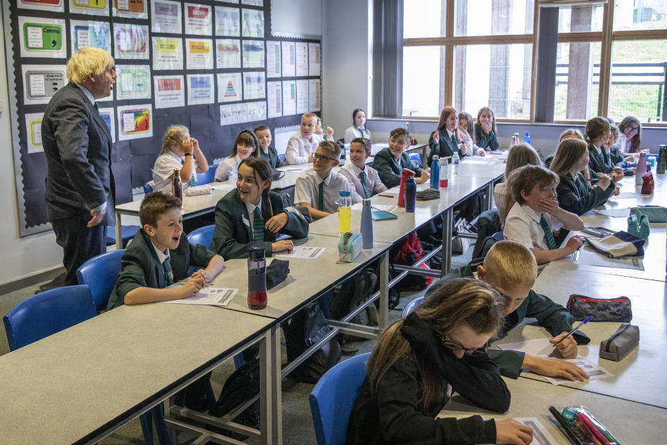 Prime Minister Boris Johnson visiting a year 7 class on their first day in school as he tours Castle Rock school, Coalville, in the east Midlands.