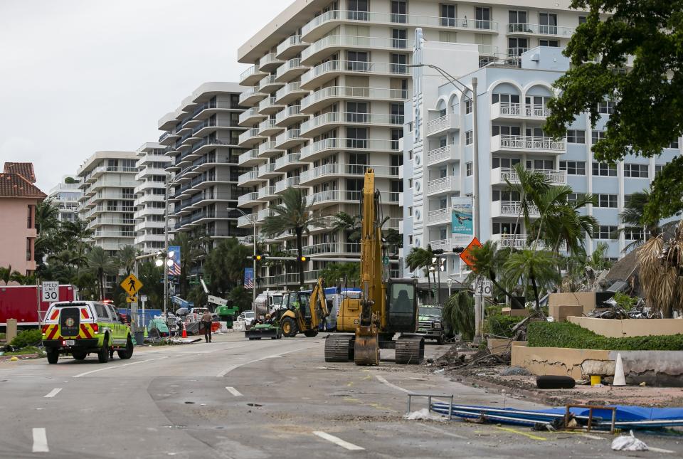 Rubble and debris of the Champlain Towers South condo can be seen in Surfside, Florida on Tuesday, July 6, 2021. The rubble shown here is from the front portion of the condo towers, which was demolished 11 days after the back part of the tower collapsed with people inside. (Matias J. Ocner/Miami Herald via AP)