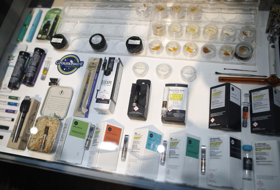 Products sit in a case inside Ground Swell cannabis dispensary in east Denver. America’s marijuana supporters have a lot to celebrate on this 420 holiday: Thirty states have legalized some form of medical marijuana, according to a national advocacy group. Nine of those states and Washington, D.C., also have broad legalization where adults 21 and older can use pot for any reason. Michigan could become the 10th state with its ballot initiative this year. Yet cannabis remains illegal under federal law, and it still has many opponents. (AP Photo/David Zalubowski)