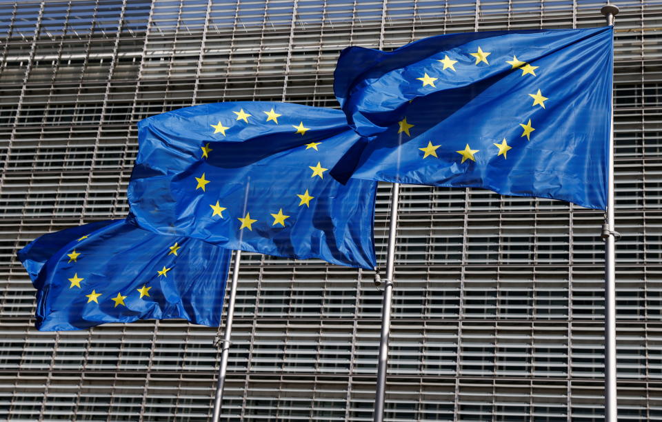 European Union flags flutter outside the EU Commission headquarters in Brussels, Belgium June 17, 2022. REUTERS/Yves Herman