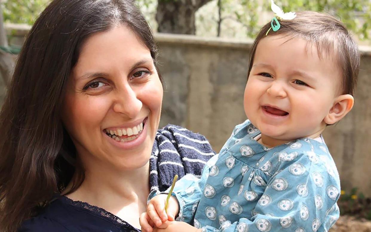 Nazanin Zaghari-Ratcliffe (L) posing for a photograph with her daughter Gabriella - AFP