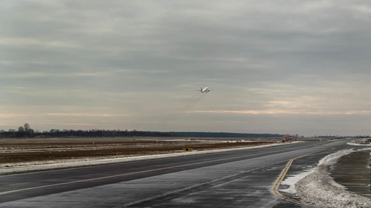 Plane takes off from the airport in Ukraine. 