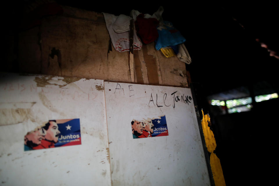 Stickers showing former Venezuelan President Hugo Chavez and President Nicolas Maduro 